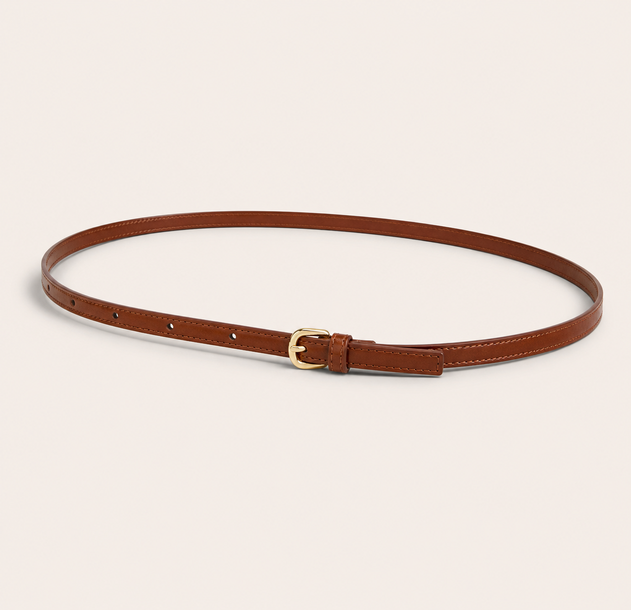 Brown belt with a gold buckle on a beige background