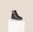 Load image into Gallery viewer, Moena Black Leather Shearling Lug Sole Boots Front View
