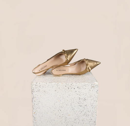 Pescara Gold Snake Heels with bow and pointed toe