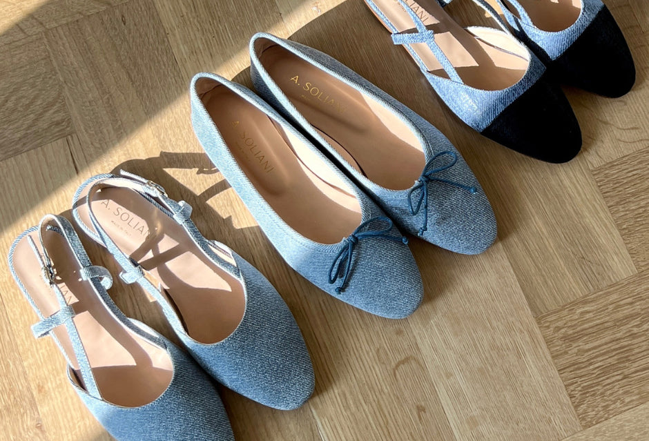 Pair of blue shoes on a wooden floor