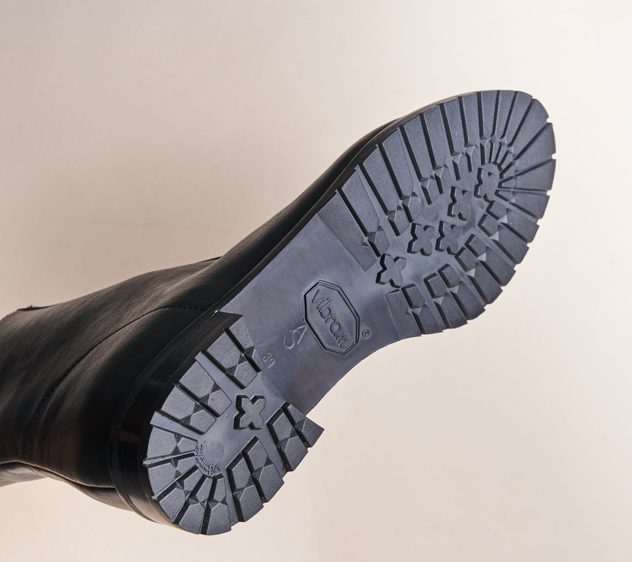 Rubber sole black boots